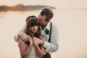 bride and groom kiss